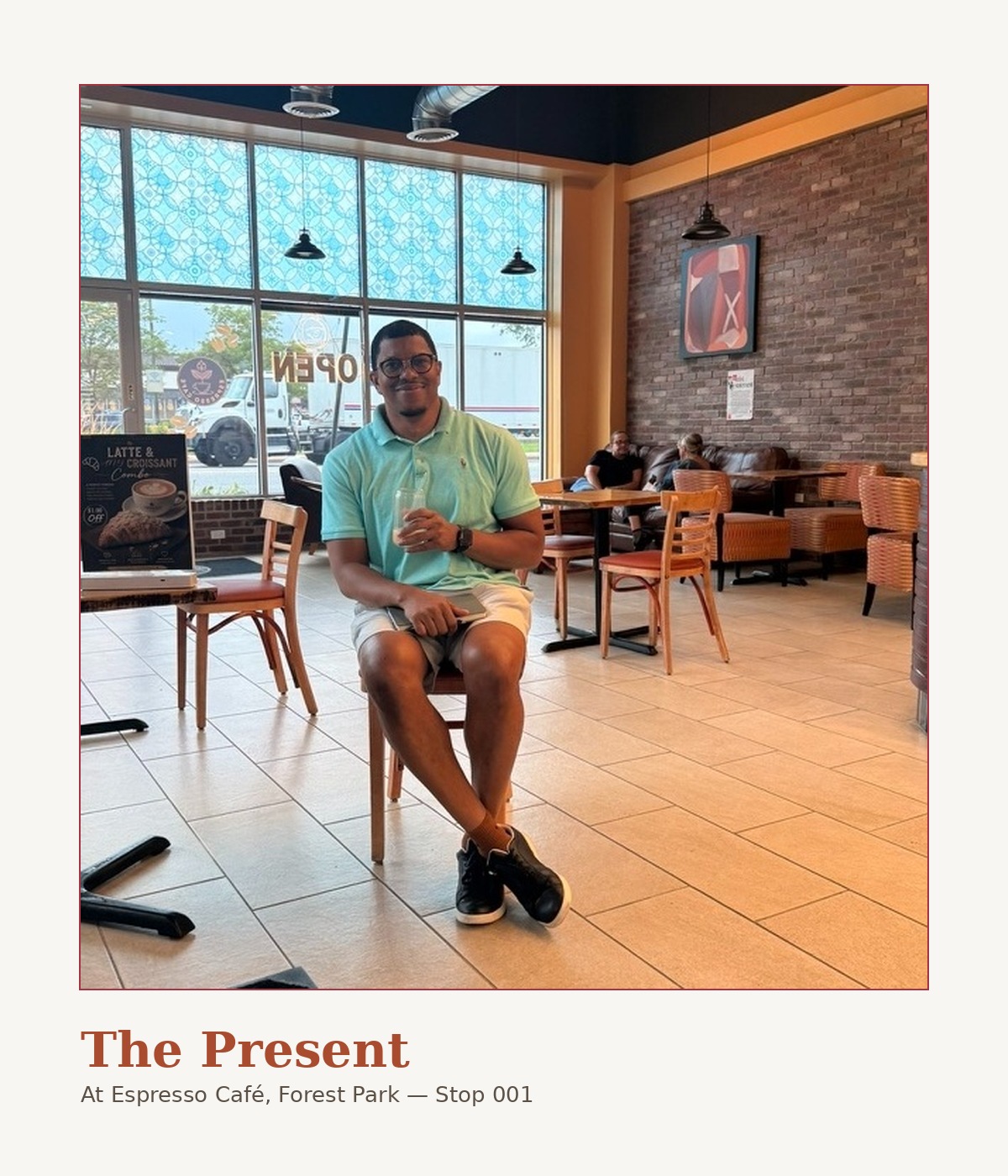Takkeem seated inside Espresso Café in Forest Park, Illinois — the first stop of the Family Coffee Tour